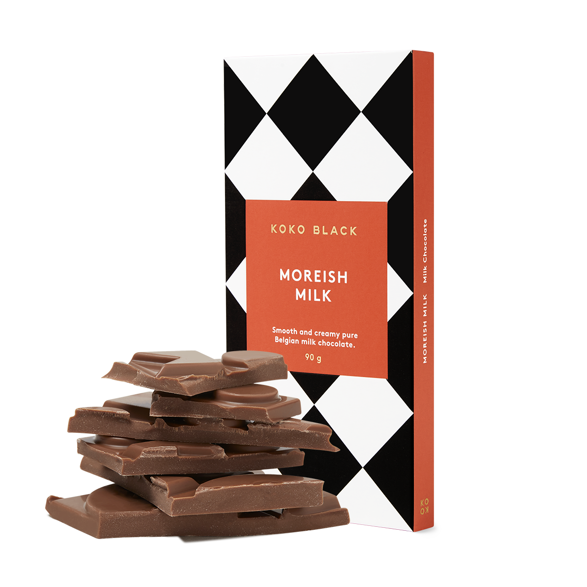 Broken chocolate pieces in front of chocolate block