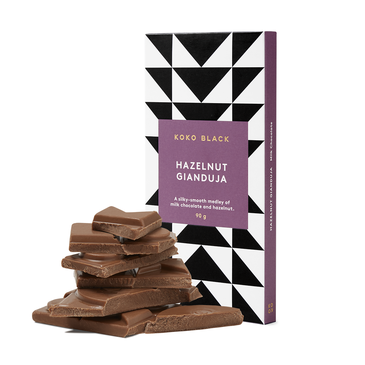 Broken chocolate pieces in front of chocolate block