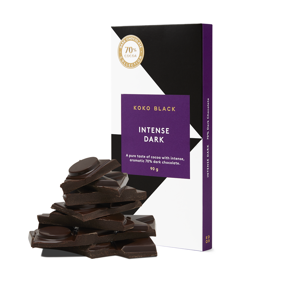 Broken chocolate pieces in front of chocolate block