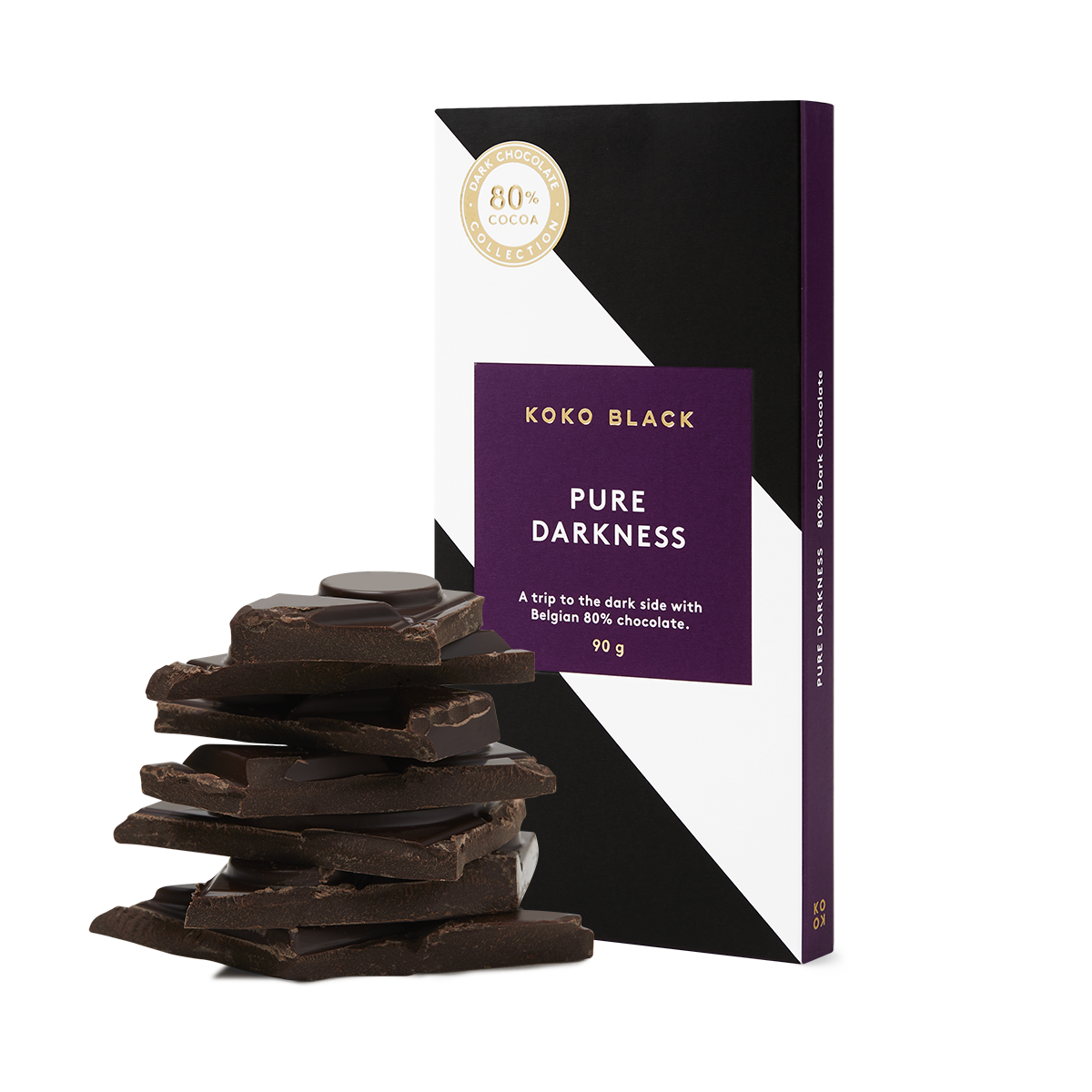 Broken chocolate pieces in front of chocolate block