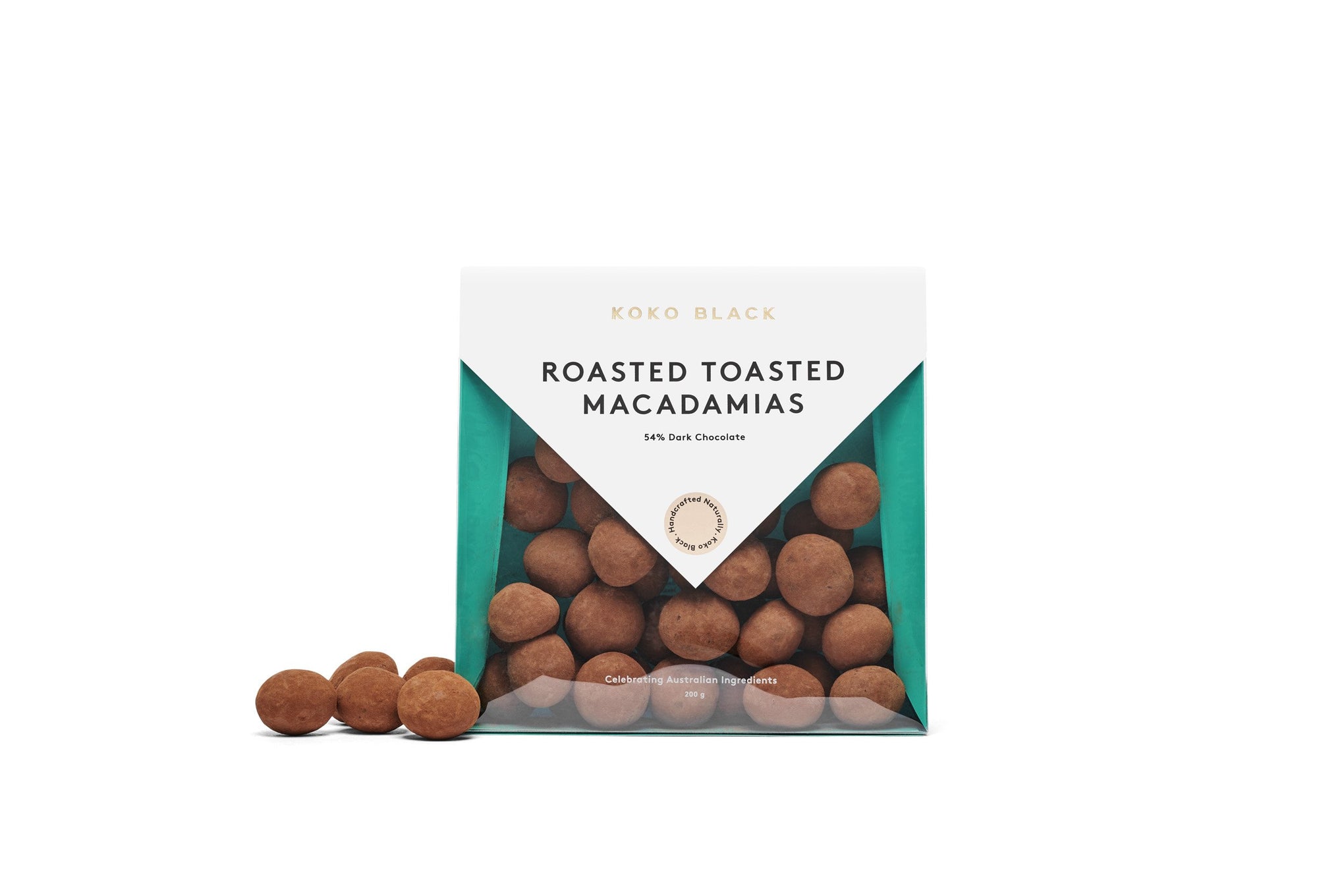 Dusted chocolate macadamias beside packaging